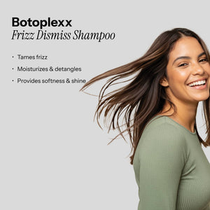 A model with long, smooth hair smiles, embodying the effects of Botoplexx K9 Frizz Dismiss Shampoo.