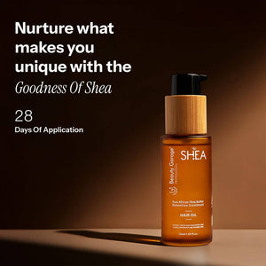A bottle of Shea Retention hair oil with a wooden cap, labeled "Pure African Shea Butter Retention Treatment,".