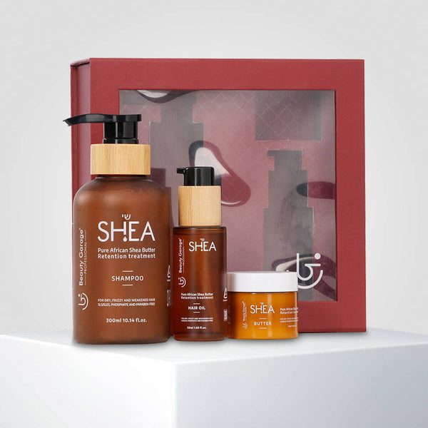 Shea retention hair care set with shampoo, oil, butter, and a gift card for deep nourishment and the perfect self-care treat.